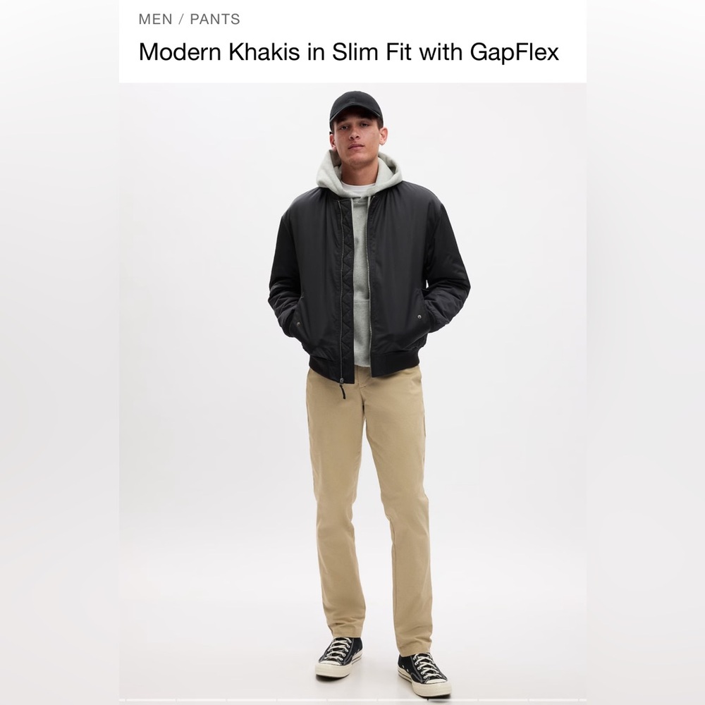 Modern Khakis (slim fit, khaki). Brand new and never worn, but tags removed.